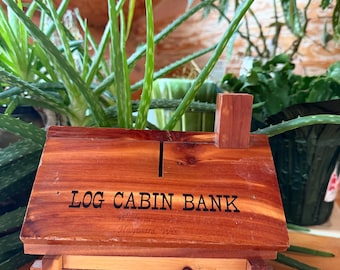 Vintage wooden log cabin bank