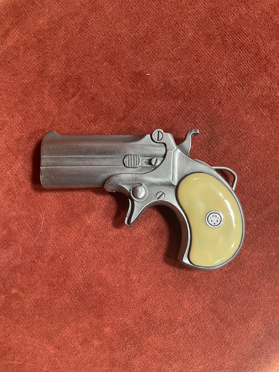 Derringer belt buckle clearance holster