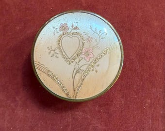 Vintage ornate glass makeup jar with pink and gold floral top