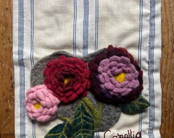 Handmade banner with needle felted flower relief and hand embroidered Latin name