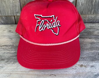 Vintage 90s Florida trucker hat red with the outline of the state and the word Florida one size fits most adjustable