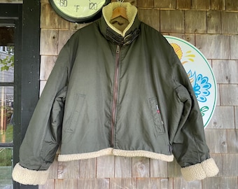 Vintage 90s Schott bomber jacket green ripstop material shearling collar and cuffs leather collar and waist straps XL US made