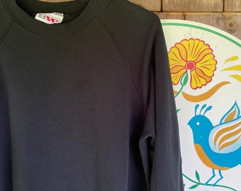 Vintage sweatshirt black crewneck raglan sleeve 50/50 made in the USA
