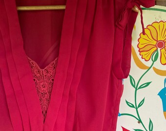Vintage 80s sleeveless blouse cranberry bows at the shoulders lace panel deep-v neck pleats wide elastic waistband small by First Glance