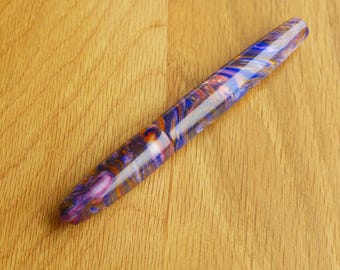 Pretty in pink, blue and gold shimmer resin. gel ink rollerball pen