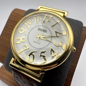 Gitano Quartz Gold Tone Watch White Dial Braided Brown Leather Strap