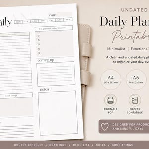 Può includere: Un foglio stampabile per pianificatore giornaliero bianco con testo nero, che include sezioni per data, orario, gratitudine, impegni, note e lista delle cose da fare. La pagina presenta sei fori per raccoglitore e indica i formati A4, A5 e US Letter.