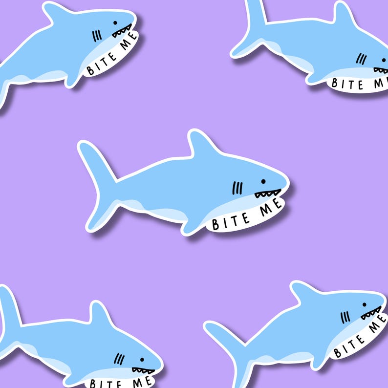 May include: A repeating pattern of light blue shark stickers on a solid purple background. Each shark is illustrated in a simple cartoon style with a white belly, small black eyes, and a white speech bubble containing the black text BITE ME.