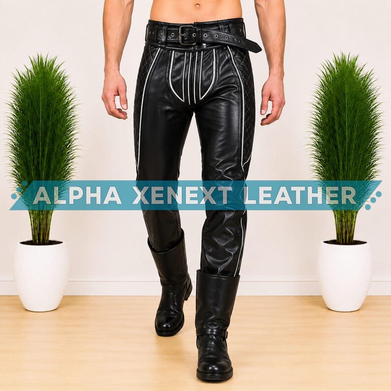 May include: Black leather pants featuring a quilted side panel design, white piping accents, and an integrated belt with a metal buckle. The pants are paired with black leather boots. The text ALPHA XENEXT LEATHER is overlaid across the center.