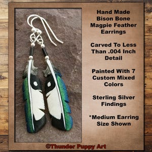 May include: Hand-carved magpie feather earrings made from bison bone. The earrings are painted with 7 custom mixed colors and feature sterling silver findings. The earrings are shown in a medium size.