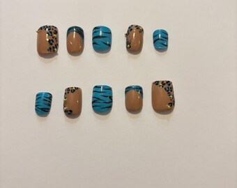Teal zebra print nails