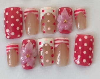 White and magenta flower nails