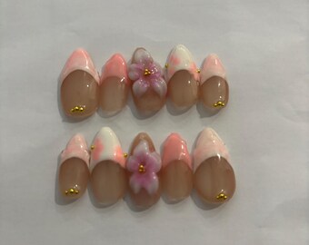 Pink and white flower nails