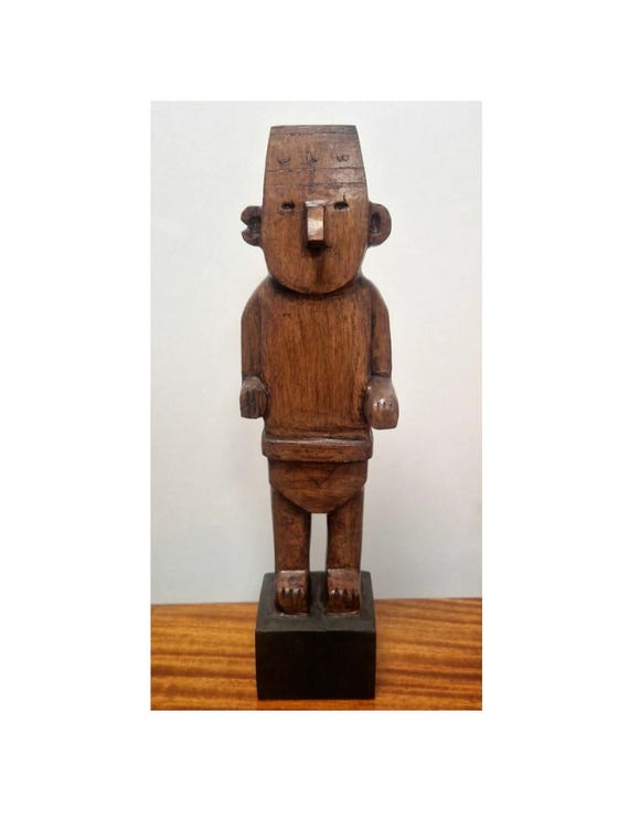 figurine fétiche en bois exotique artisanale, faite main, inspirée de l’univers de Tintin