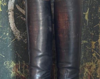 Antique pair of  leather boots with the original lasts or boot form / stretchers.
