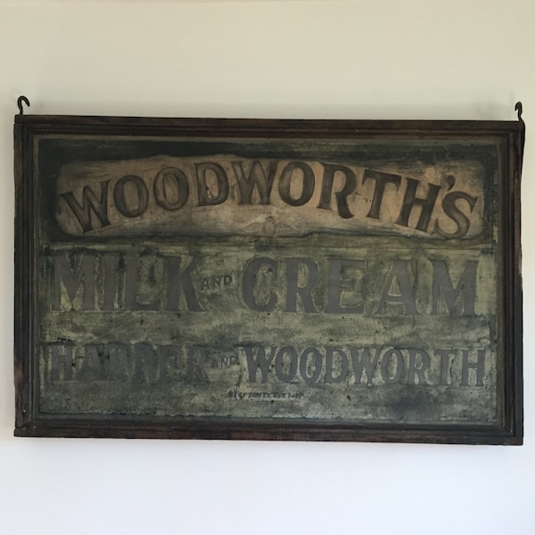 Antique advertisement hand painted sign
