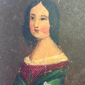 May include: A painting of a woman with dark hair wearing a green and red dress with a white collar. The background is dark.