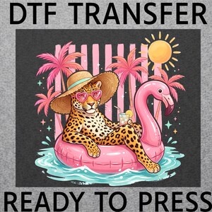 May include: A DTF transfer ready to press featuring a leopard wearing a straw hat and pink heart-shaped sunglasses, lounging in a pink flamingo pool float. The scene includes pink palm trees, a yellow sun, and water, with text reading DTF TRANSFER READY TO PRESS.
