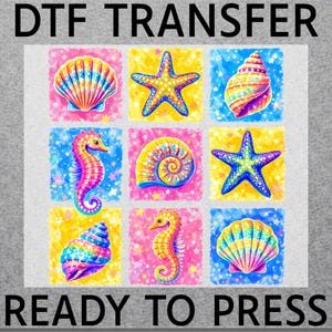 May include: A DTF TRANSFER READY TO PRESS graphic featuring a grid of nine squares with colorful sea life illustrations including seashells, starfish, and seahorses. Each square has a vibrant background of yellow, pink, or blue with star patterns.