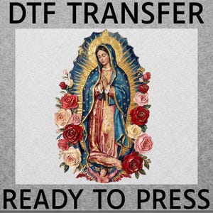 May include: DTF TRANSFER READY TO PRESS. A religious image of a woman in a blue and gold robe, surrounded by red and pink roses. The image has the text "DTF TRANSFER" at the top and "READY TO PRESS" at the bottom.