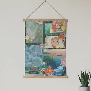 May include: A poster featuring a collage of animated scenes, including a goldfish, a girl with red hair, and various landscapes. The poster is held by wooden bars and suspended by a string, creating a decorative wall hanging.