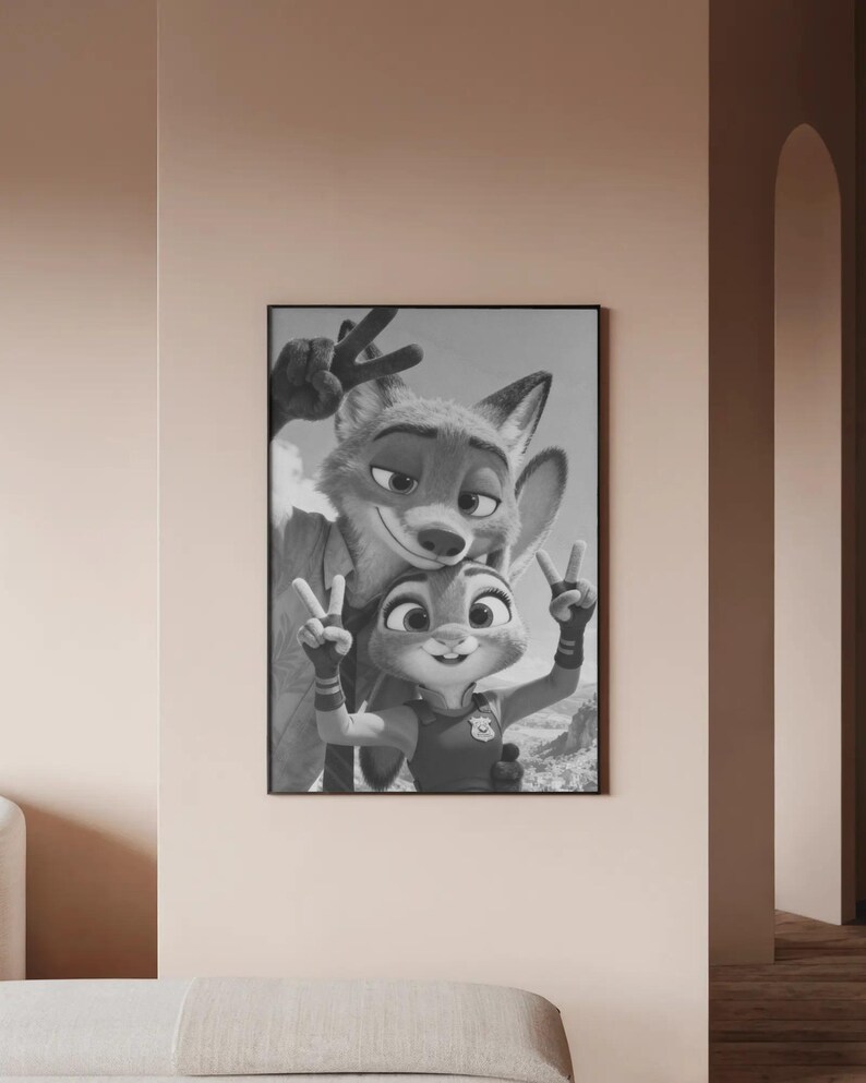 May include: A black and white framed wall art print featuring a fox and a rabbit character posing together. Both characters are making a peace sign gesture with their hands. The fox is positioned behind the rabbit, and both are smiling.
