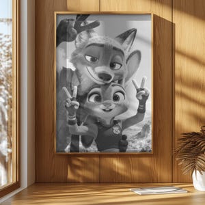 May include: A black and white framed wall art print featuring a fox and a rabbit character posing together. Both characters are making a peace sign gesture with their hands. The fox is positioned behind the rabbit, and both have expressive faces.