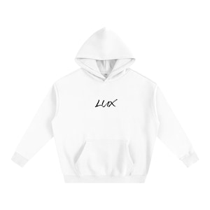 May include: A white hooded sweatshirt with a front pocket and a hood. The word "LUX" is written in black cursive script on the chest. The sweatshirt has long sleeves and a relaxed fit.