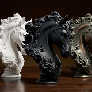 May include: Three decorative horse head sculptures in white, black, and bronze. The sculptures have detailed manes and ornate embellishments. They are displayed on a dark wooden surface, showcasing their elegant design.
