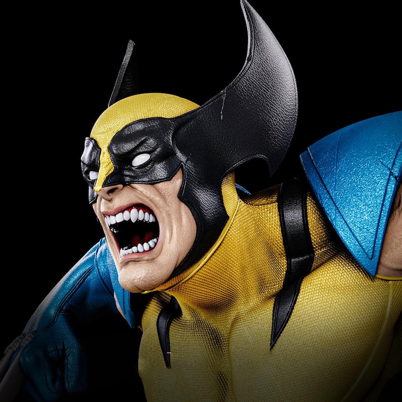May include: A detailed bust of Wolverine, a comic book character, with a fierce expression. The figure features a yellow and blue costume, a black mask, and prominent claws. The character's mouth is open, revealing teeth.
