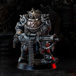 May include: A detailed miniature figure of a heavily armored character, holding a large machine gun. The figure is primarily metallic with visible rivets, chains, and a respirator-style helmet. The figure stands on a black base.