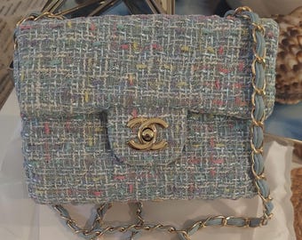 CC Beauté baby blue tweed flap bag with woven chain strap EUC