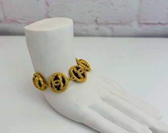 CC Medallion Gold Logo Bracelet GWP