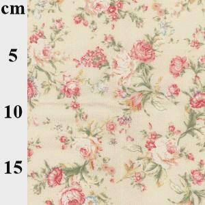 May include: Close-up of a floral fabric with a cream background. The fabric features a pattern of pink and red roses with green leaves. Measurements in centimeters are visible on the left side of the image.