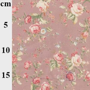 May include: Close-up of a floral fabric with a repeating pattern of pink and cream roses, green leaves, and small blue flowers on a mauve background. The fabric is measured in centimeters, with a visible scale up to 15 cm.
