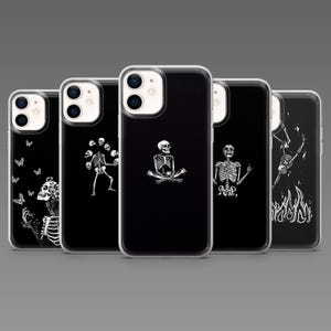 May include: A collection of black phone cases with white skeleton designs. The cases feature various skeleton illustrations, including a meditating skeleton, a skeleton juggling skulls, and a skeleton with flames.