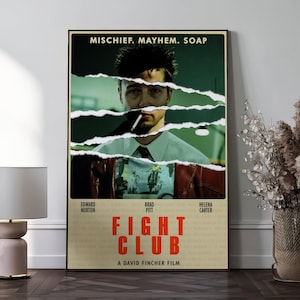 Könnte beinhalten: Gerahmtes Filmplakat für "Fight Club" mit Edward Norton, Brad Pitt und Helena Carter. Das Poster hat einen zerrissenen Papiereffekt über den Gesichtern der Schauspieler. Der Titel "Fight Club" ist rot.
