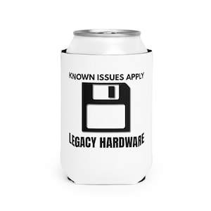 May include: A white foam can cooler featuring a black graphic of a floppy disk icon centered on the front. The text KNOWN ISSUES APPLY is printed in black above the icon, and the text LEGACY HARDWARE is printed in black below the icon.