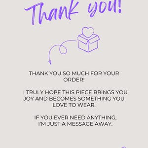 May include: A light beige thank you card featuring purple text that reads Thank you! and includes a line drawing of a gift box with a heart. The card text states: THANK YOU SO MUCH FOR YOUR ORDER! I TRULY HOPE THIS PIECE BRINGS YOU JOY AND BECOMES SOMETHING YOU LOVE TO WEAR. IF YOU EVER NEED ANYTHING, I&rsquo;M JUST A MESSAGE AWAY. VIBESFORYOU.DE A FEELING NOT A PRODUCT.