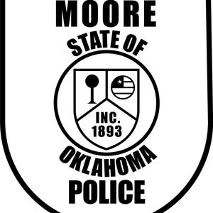 May include: A black and white police badge with the words "MOORE", "STATE OF", "OKLAHOMA", and "POLICE". The badge includes a circular emblem with a shield design and the text "INC. 1893".