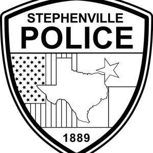 May include: Black and white Stephenville Police badge. The badge features the text "STEPHENVILLE POLICE" at the top, with the year "1889" at the bottom. The Texas state outline and a star are in the center, with a US flag design on the left.