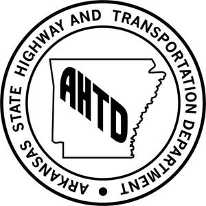May include: A circular black and white emblem featuring the outline of the state of Arkansas in the center. The letters AHTD are printed in bold black font inside the state outline. The text ARKANSAS STATE HIGHWAY AND TRANSPORTATION DEPARTMENT is printed in a circular border around the central design.