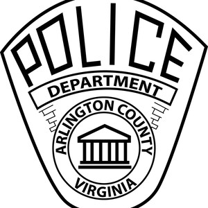 May include: Black and white Arlington County Police Department badge. The word "POLICE" is at the top, with "DEPARTMENT" below it. The center features a circular design with "ARLINGTON COUNTY" and "VIRGINIA" surrounding a building illustration.