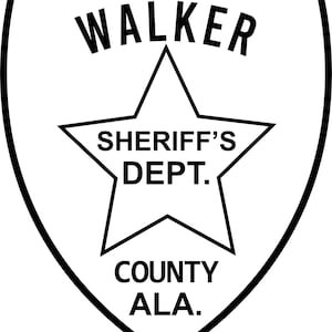 May include: A black and white Walker County Sheriff's Department badge. The shield-shaped badge features the word "WALKER" at the top, a star in the centre with "SHERIFF'S DEPT." inside, and "COUNTY ALA." at the bottom.
