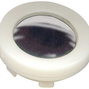 May include: A circular, off-white plastic component featuring a central, reflective, convex mirror insert. The object has a smooth, rounded outer rim and a series of small, protruding tabs along the bottom edge for secure attachment or mounting.