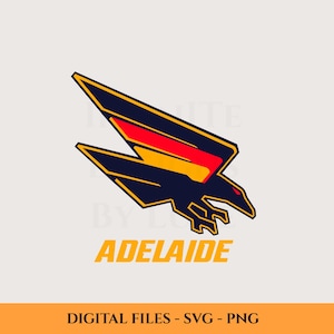 May include: A graphic logo of a black eagle with red, yellow, and orange details, and the word "ADELAIDE" in yellow. The eagle is depicted in mid-flight. The design is set against a light beige backdrop.