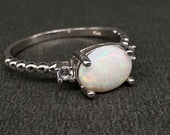 Australisk opalring sterlingsilver 8 x 6 mm Coober Pedy massiv naturlig opalring storlek 7