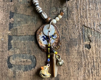 bottle cap talisman necklace: lite yellow chick