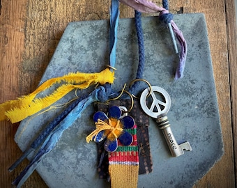 peace - stamped key with enamel flower, shoelace, silk and cotton