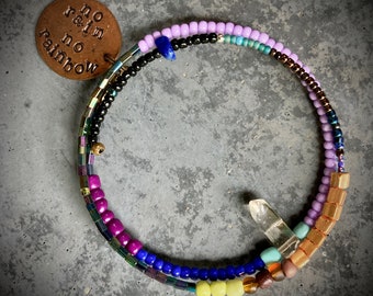 no rain no rainbow - beaded wire bracelet with stamped penny, glass beads, lapis stone and crystal